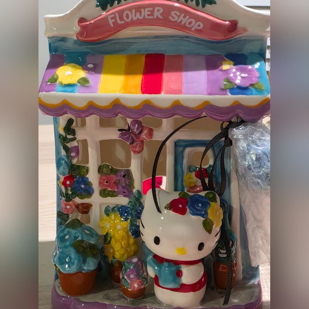 NWT Sanrio Hello Kitty Ceramic Floral Garden Shop Candle House - Picture 8 of 15